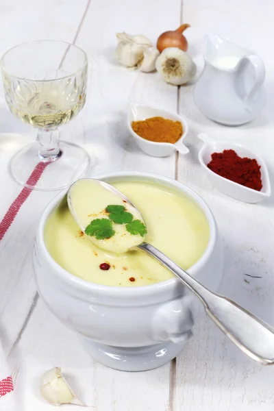 French cuisine: garlic soup and a wineglass — Stock Photo, Image