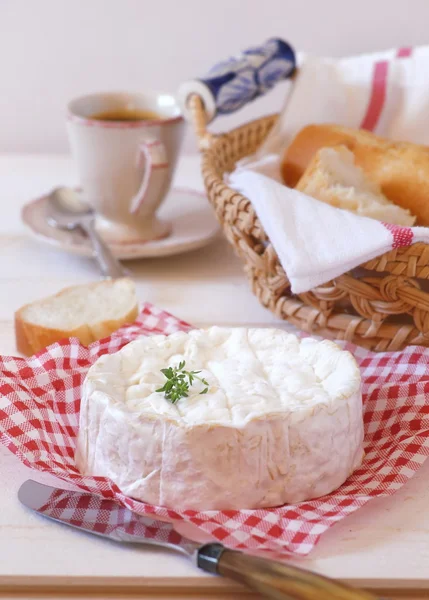 Camembert cheese, baguette and cup of coffee — Stock Photo, Image