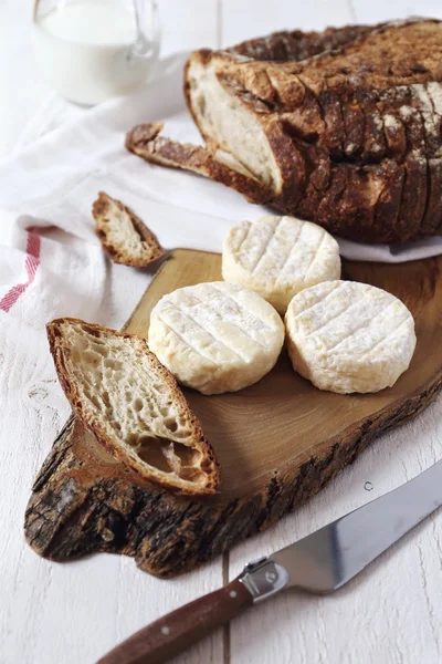 Goat cheese and  country  bread — Stock Photo, Image