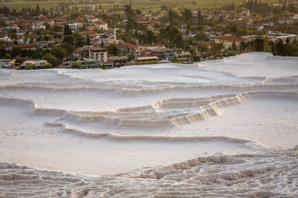 Pamukkale carbonate mineral field at sunset — Stock Photo, Image