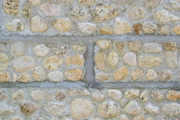 A superfície da pedra pedras parede fundo — Fotografia de Stock