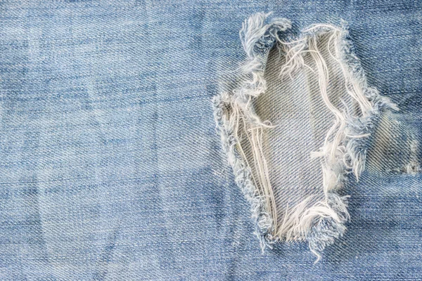 Zbliżenie denim jeans tekstury, stary tło dżinsy — Zdjęcie stockowe