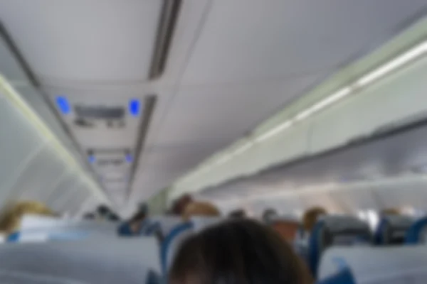 Blurred inside airplane ,cabin aircraft in flight