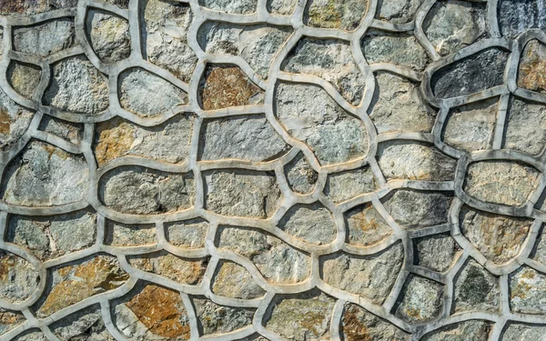 Beton met stenen muur — Stockfoto