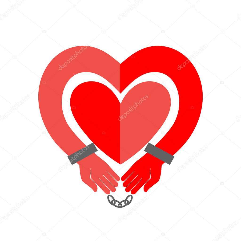 Marriage or relationship as a prison male or female hands in the shape of a heart in handcuffs a symbol of love or codependency