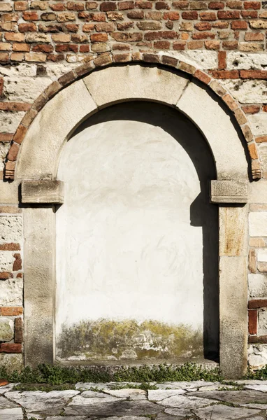 Boog op de muur — Stockfoto