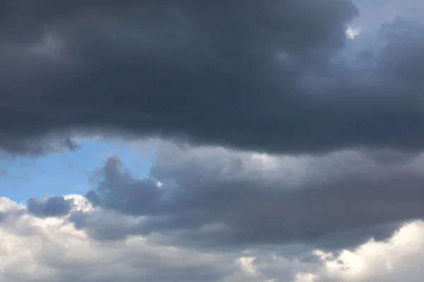 Sky With Clouds. A Cloudy Landscape With A Blue Gray White Cloud Covered With Layers. Background Image