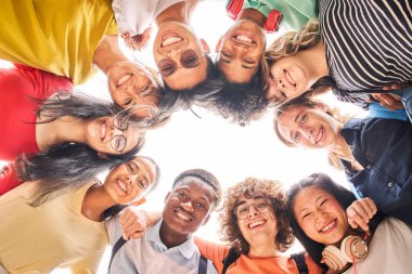 Group of students are together, happy and smiling. Looking at camera.