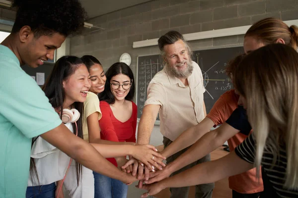 Group of students Teamwork with a teacher. Stacking Hand Concept. — Stock Photo, Image