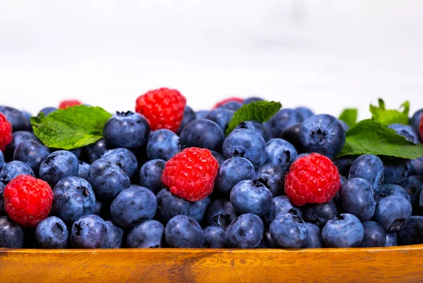 Blueberry Raspberry Green Mint Leaf Wooden Bowl White Top View — Stock Photo, Image