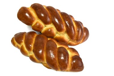 Beyaz arkaplanda at kuyruklu çörek