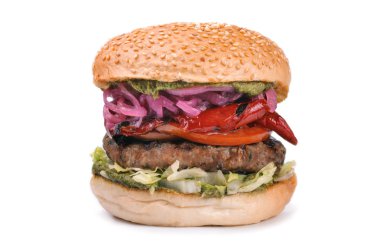 Büyük lezzetli hamburger burger üzerine beyaz izole pesto ile 
