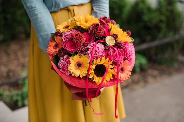 Girl holding colorful bouquet with different Gerbera flower — Stock Photo, Image