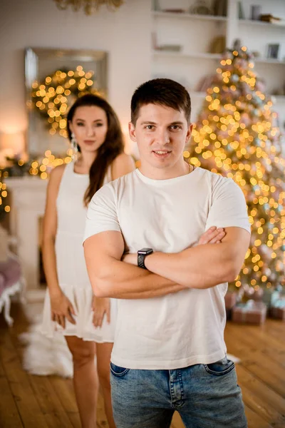 Portrait of young man with arms crossed on his chest — Stock Photo, Image