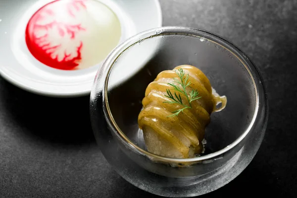 Molecular gastronomy, beautiful dessert dish with decoration. Exquisite dish, creative meal concept.