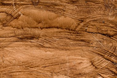 Kırmızı paslı, fırça darbelerinin dokusuyla boyanmış yüzey parçası..