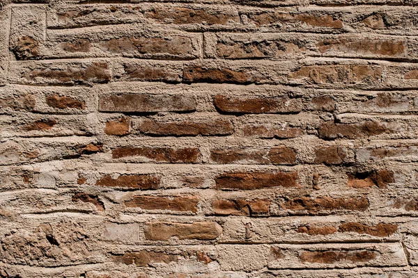 Fragment elewacji starego budynku z murem murowanym — Zdjęcie stockowe