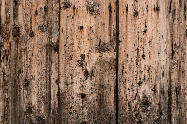 Nahaufnahme auf alten Holzplanken des Zauns mit Absplitterung. — Stockfoto