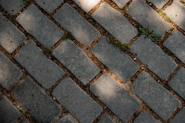 Background from grey square paving stones of natural stones — Stock Photo, Image