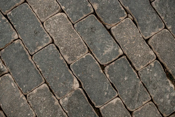 Top view of popular street paving slabs. Paving texture of the stones and boulders — Stock Photo, Image