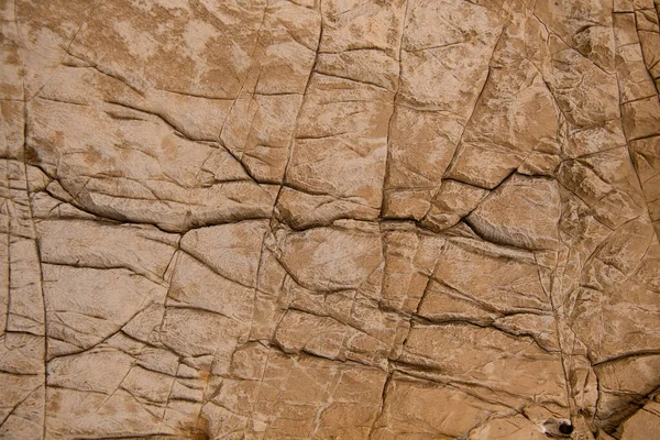 Közelkép a régi kő megkönnyebbülés csodálatos erózió textúrák és minták rajta — Stock Fotó