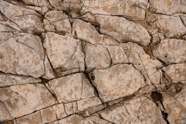 Close-up de relevo de pedra natural com maravilhosas texturas erosão e padrões sobre ele — Fotografia de Stock