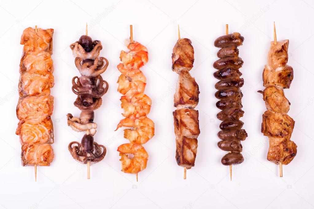 Set of different meat skewers