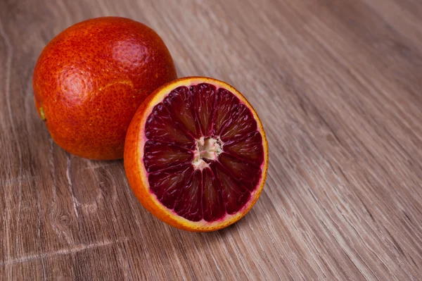 Red blood sicilian orange whole and half — Stock Photo, Image