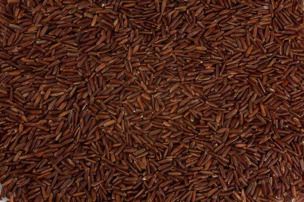 Riso rosso grano texture sfondo — Foto Stock