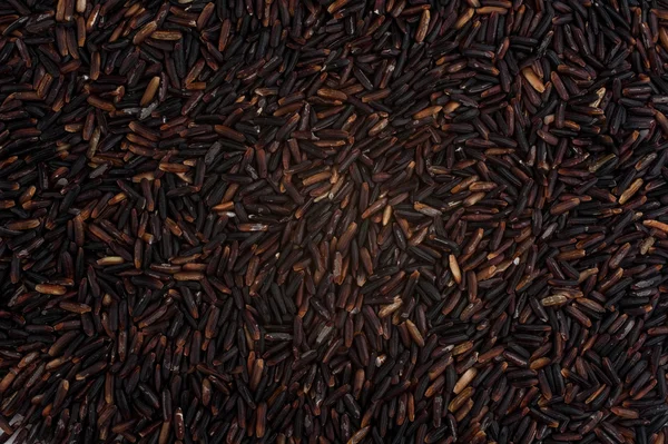 Fondo de textura de primer plano de arroz negro — Foto de Stock