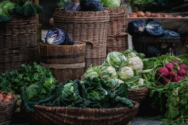 Baskets with vegetables on a old market 