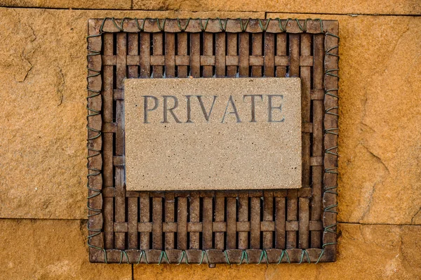 sign private on lime stone background