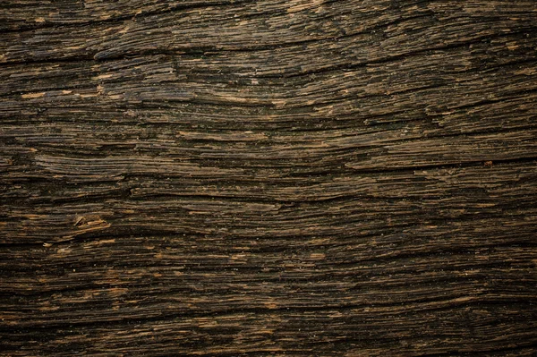 Grungy gebarsten hout door close-up getextureerde achtergrond — Stockfoto