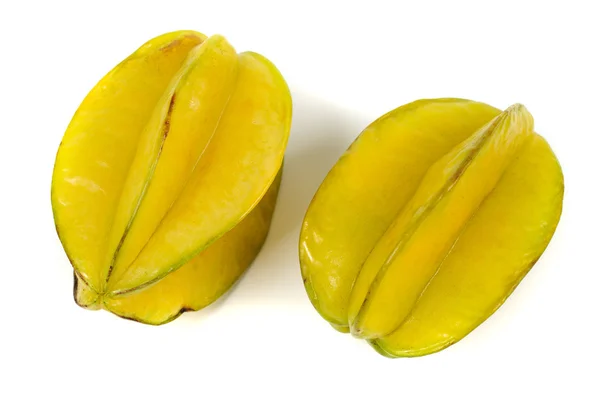 Két averrhoa karambola starfruits összetétele elszigetelt fehér háttér felett — Stock Fotó