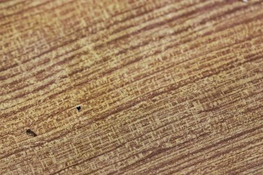 Çapraz çizgileri olan ahşap desenli bir arkaplana yakınlaş