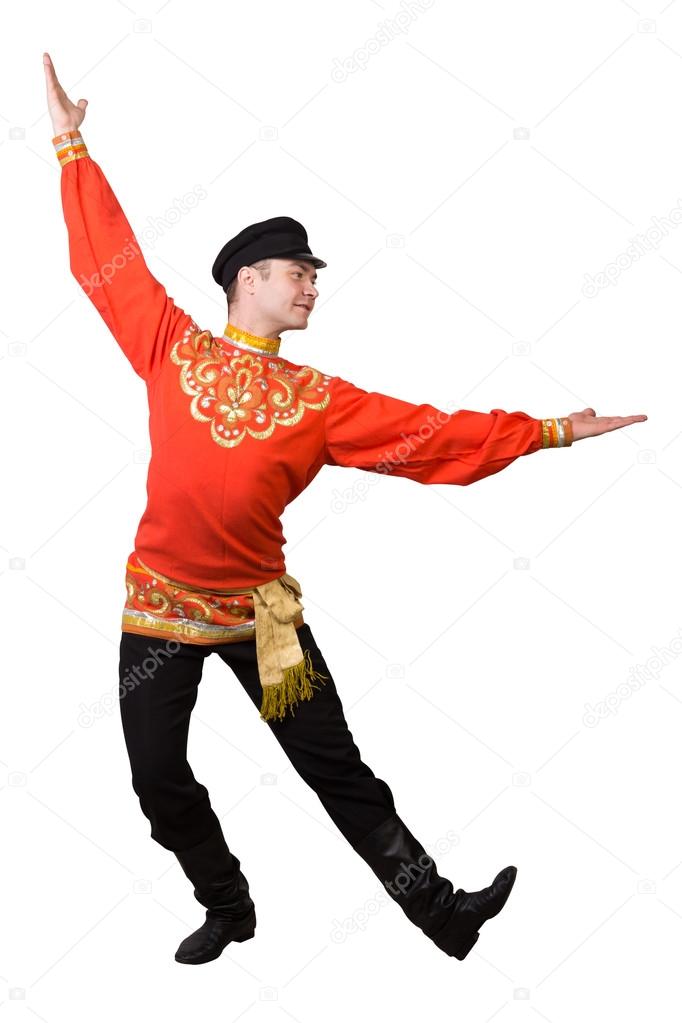 attractive caucasian guy dancing in folk costume