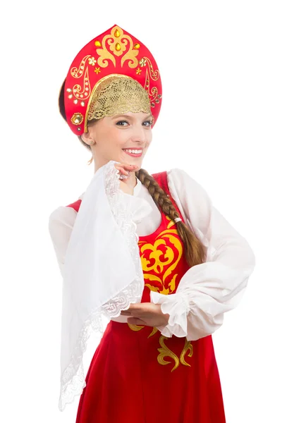 Vacker leende kaukasiska flicka i ryska folklig dräkt Stockbild