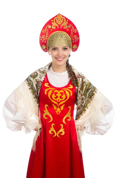 Mooi lachende Russische meisje in folk kostuum — Stockfoto