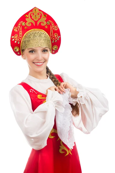 Mooi lachende Russische meisje in folk kostuum — Stockfoto