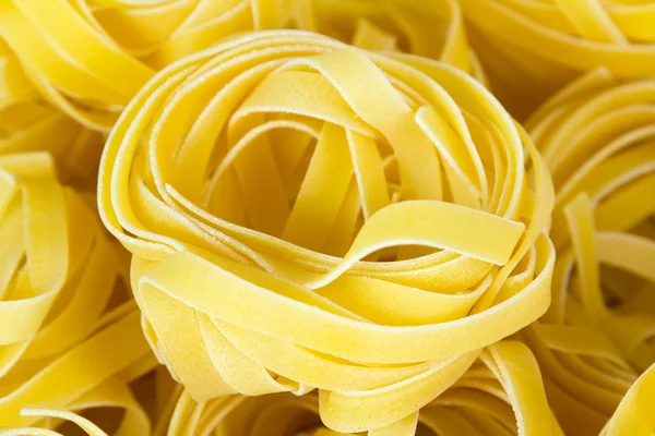 Italian pasta raw food background — Stock Photo, Image