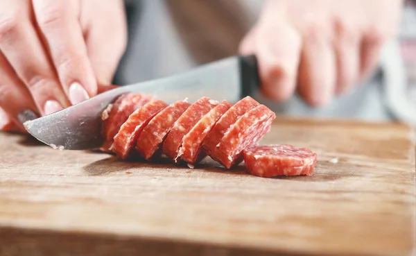 Sausage Knife Hands Woman Slicing Sausage Thick Pieces Wooden Plank Stock Image