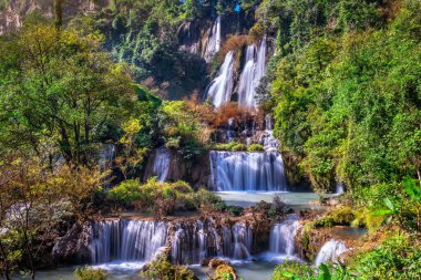 Thi Lo Su waterfall(Tee Lor Su) in Tak province. Thi Lo Su waterfall the largest waterfall in Thailand. clipart