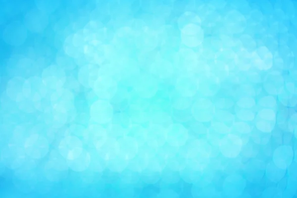 Abstract blue bokeh en achtergrond wazig. — Stockfoto