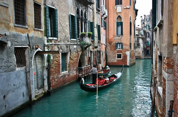 Gondola on a Venetian canal — Stock Photo, Image