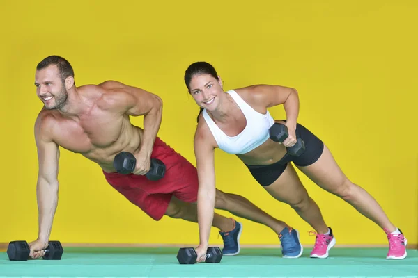 Joven en forma hombre y mujer —  Fotos de Stock