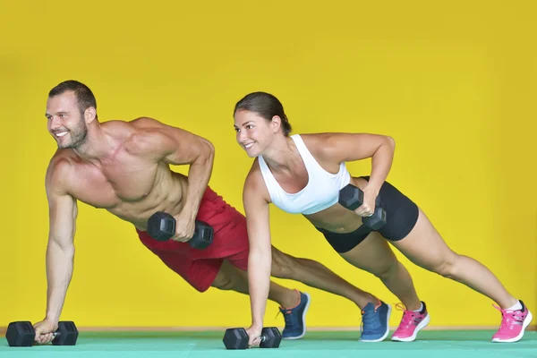 Joven en forma hombre y mujer —  Fotos de Stock