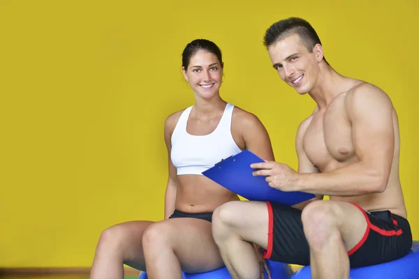 Young fit man and woman — Stock Photo, Image