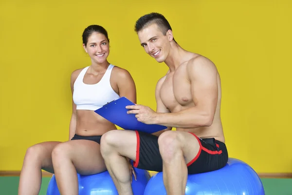 Young fit man and woman — Stock Photo, Image