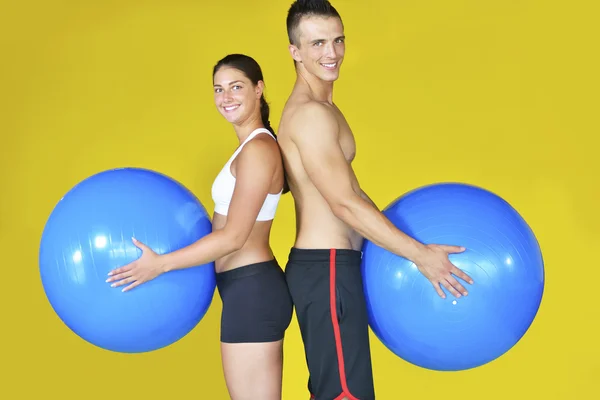 Young fit man and woman — Stock Photo, Image