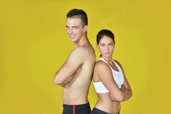 Young fit man and woman — Stock Photo, Image